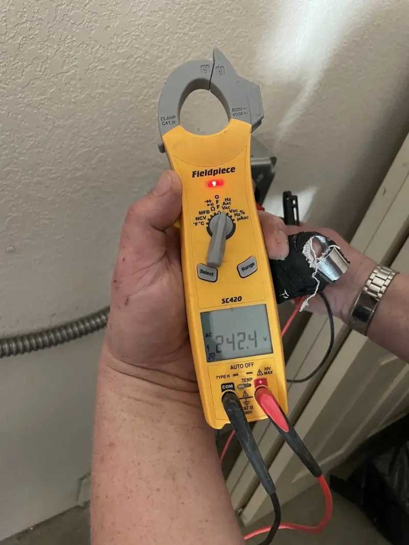 Voltage testing with clamp meter during Generator Installation in Hollywood